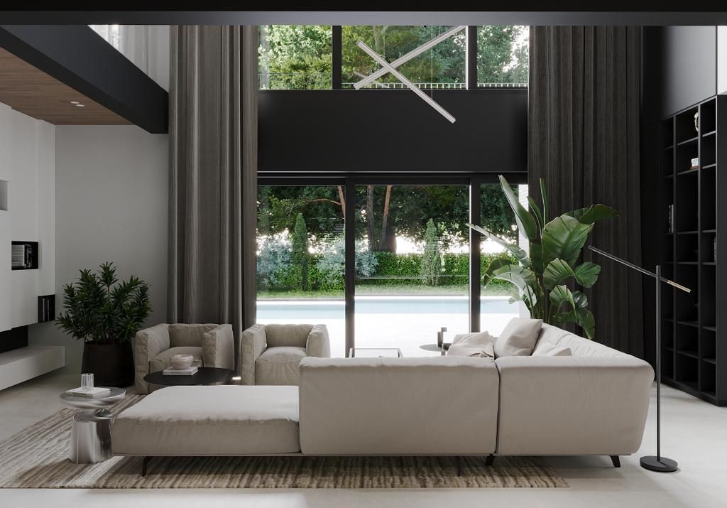 Modern living room with neutral-toned furniture, large windows, and a view of greenery.