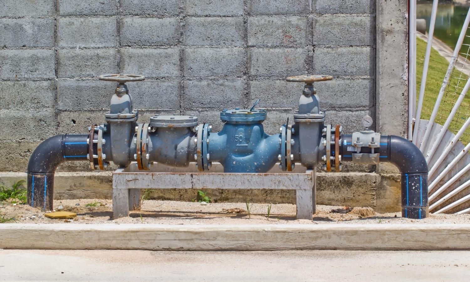 What is a backflow test plumb works