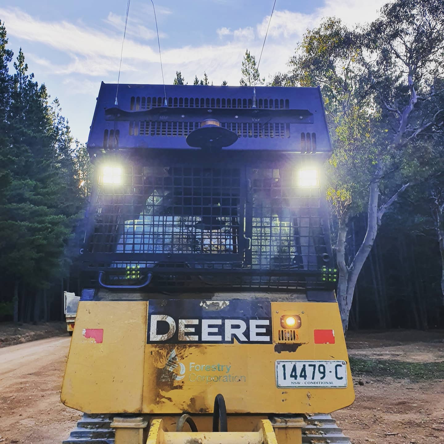 Earthmover on dirt road — Mobile Auto Electrician in Kelso, NSW