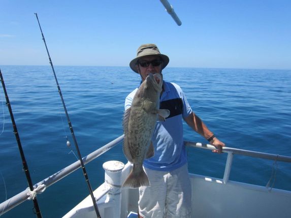 Man Caught Big Fish - Deep Sea Fishing in Tarpon Springs, FL