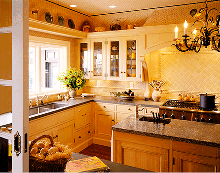 A kitchen with a sink stove and a chandelier