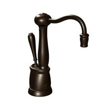 A close up of a black faucet on a white background.