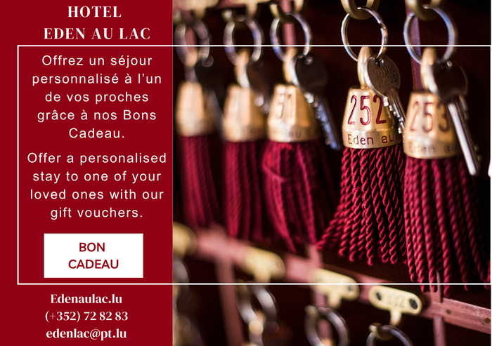 Certificat cadeau Hôtel Eden au Lac avec clés et pompons.
