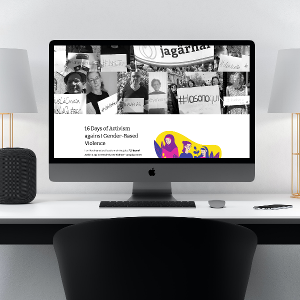 laptop with I Am Here International website on screen