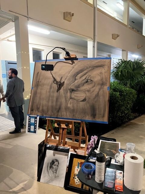 An easel with a drawing of a lion on it