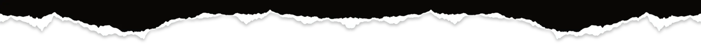 A pattern of rounded shapes in a black and white image.