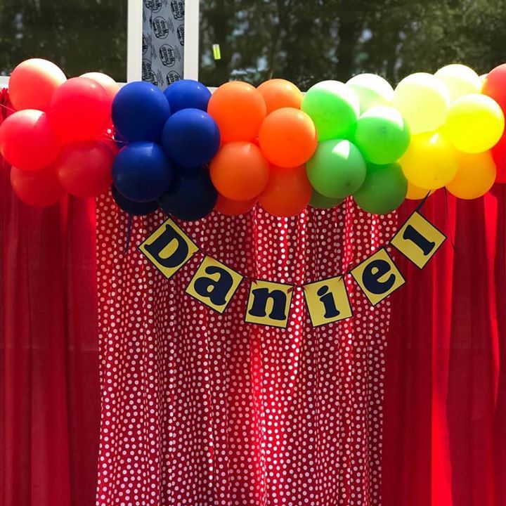 A simple balloon garland that made all the difference for Daniel's sign.