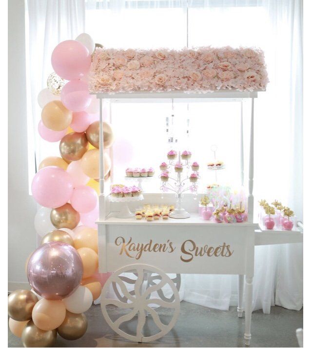 The letters L, O, V and E are acting as the base of a table.