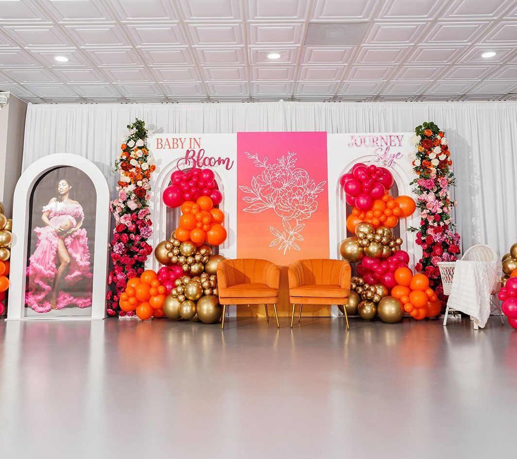 Neutral balloon backdrop with blush and brown tones for baby shower or birthday party