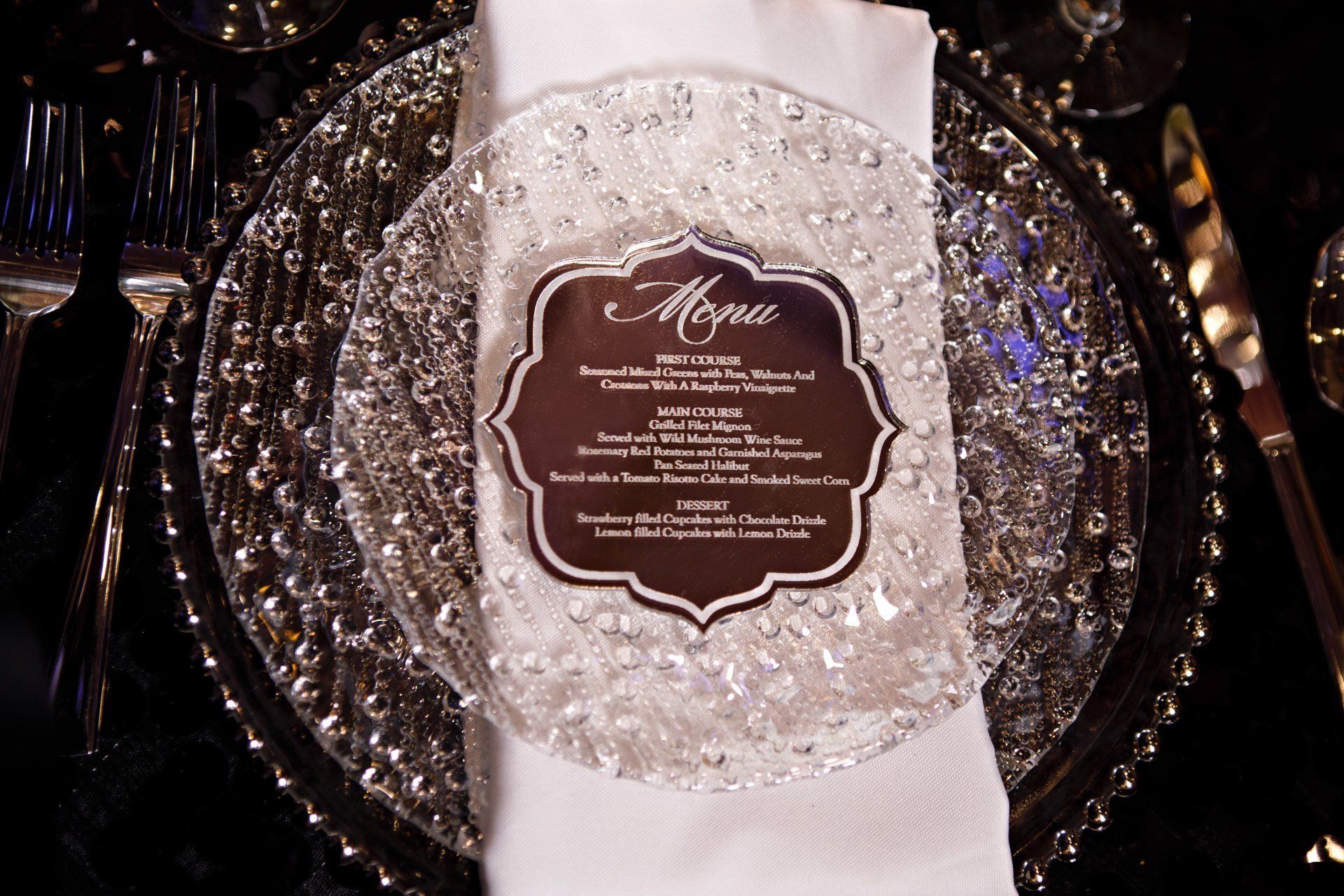 A laser cut event menu for a place setting.