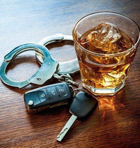 Car keys, handcuffs, and alcoholic beverage in Raeford, NC