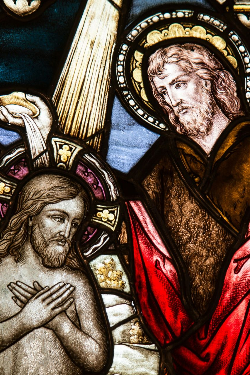 Three lit candles at Enlightened Life Temple in Denver, CO