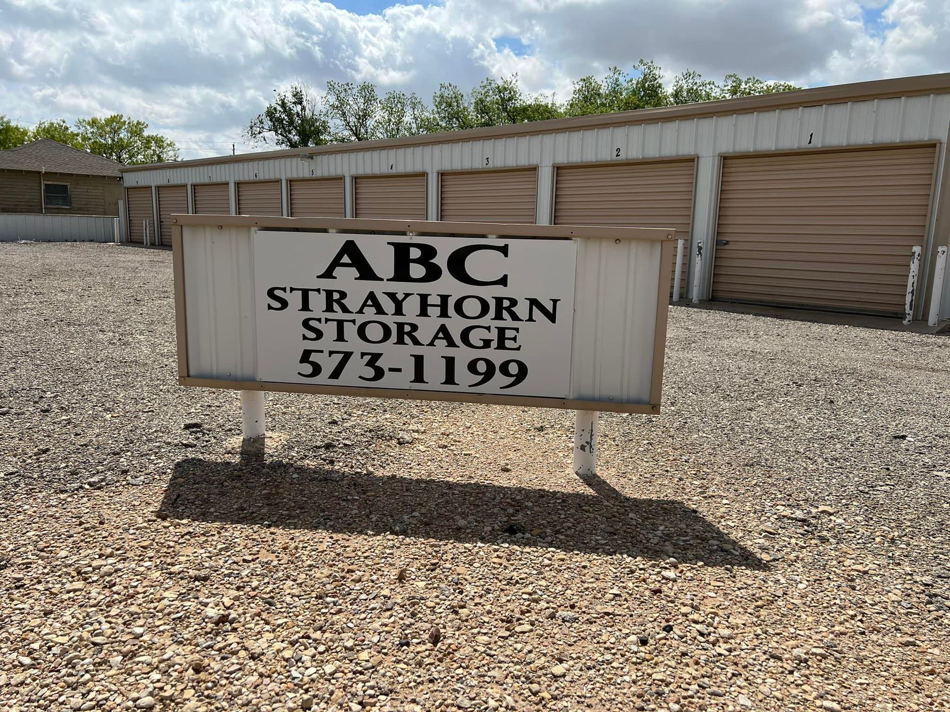 A sign that says ABC Strayhorn Storage 573-1199