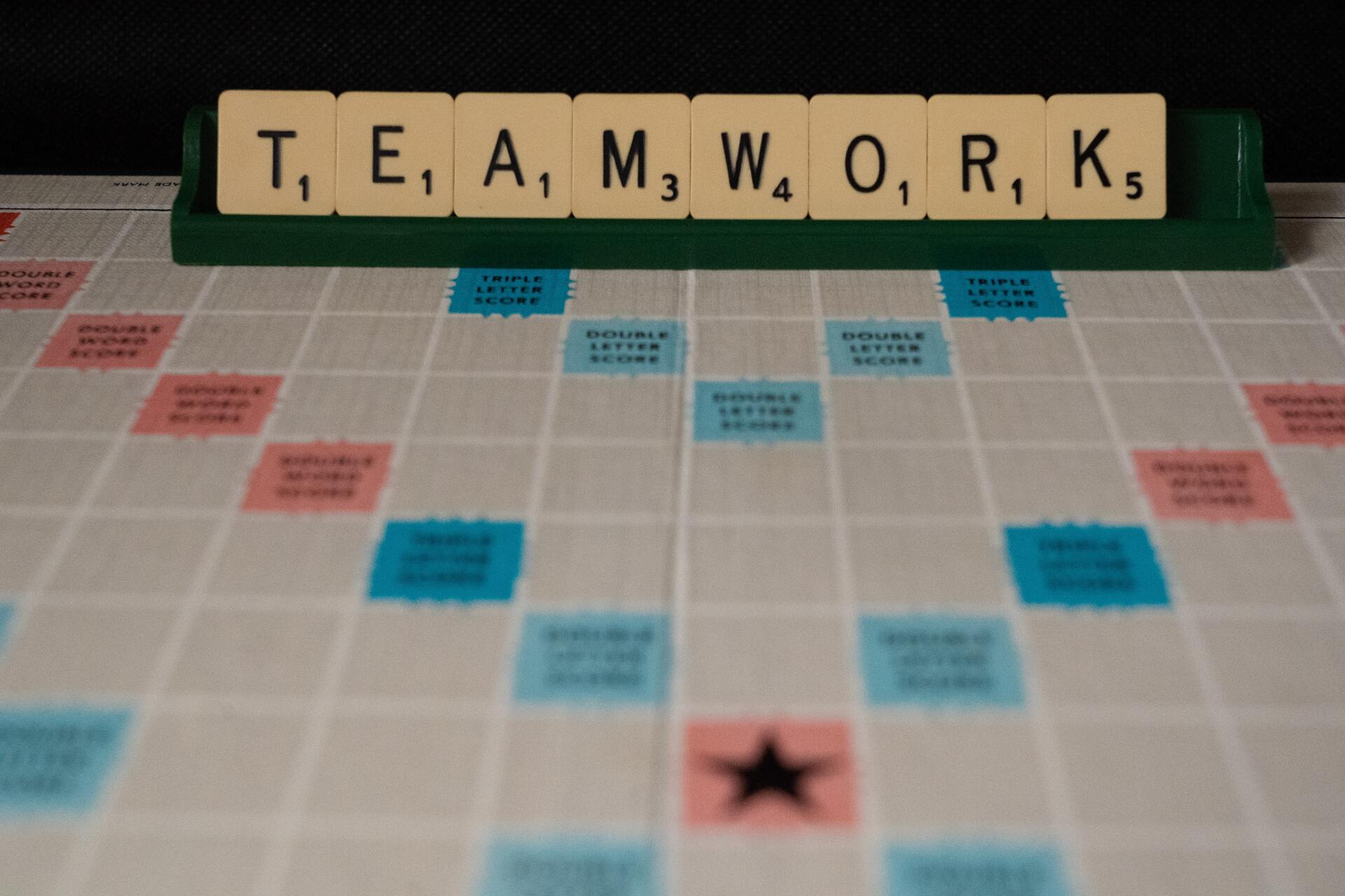 Teamwork spelled out in a scrabble game