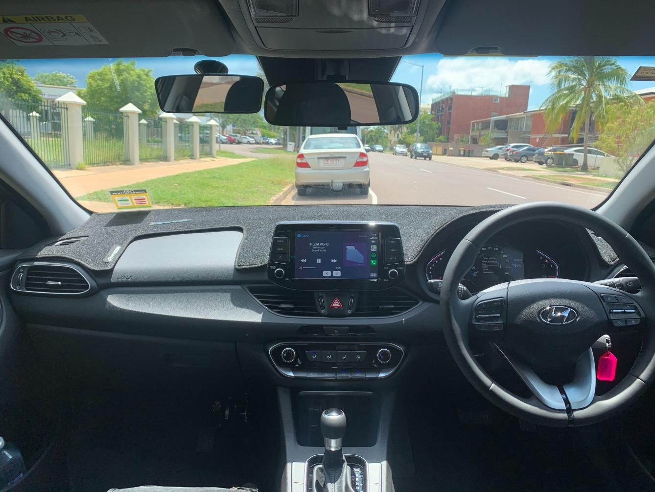 A Interior Of Car With A Steering Wheel And Dashboard — Primera Driving School Darwin In Anula, NT