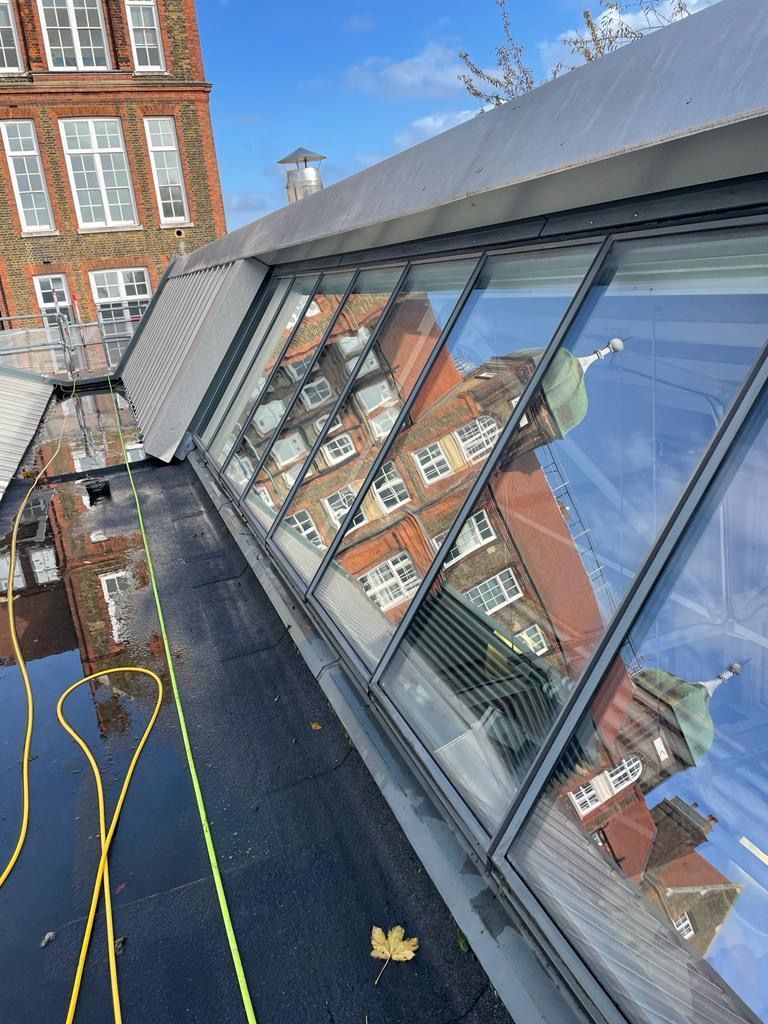Shiny clean rooftop windows after being cleaned by professional window washing company