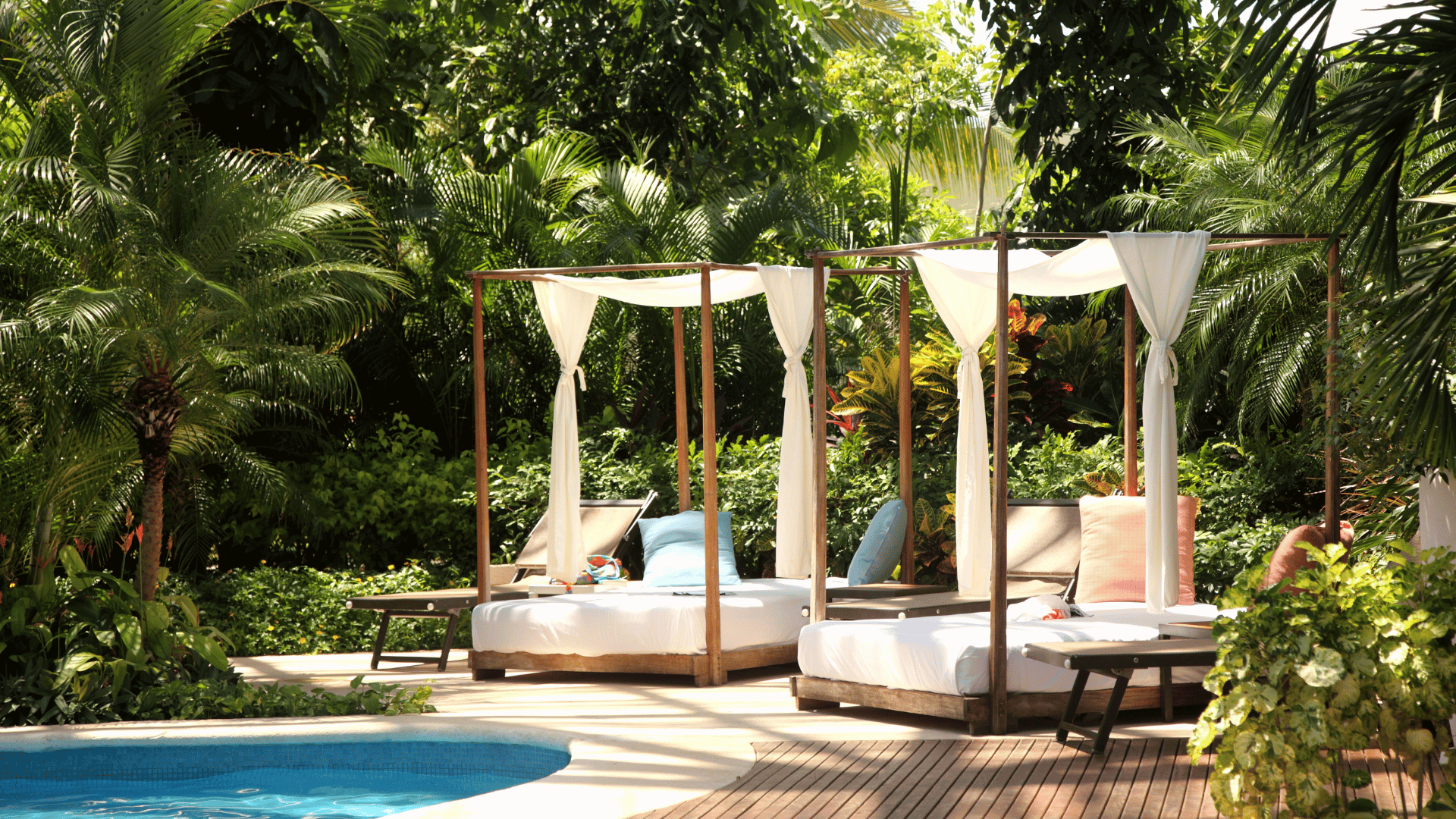 a light hanging from the ceiling with a cage around it