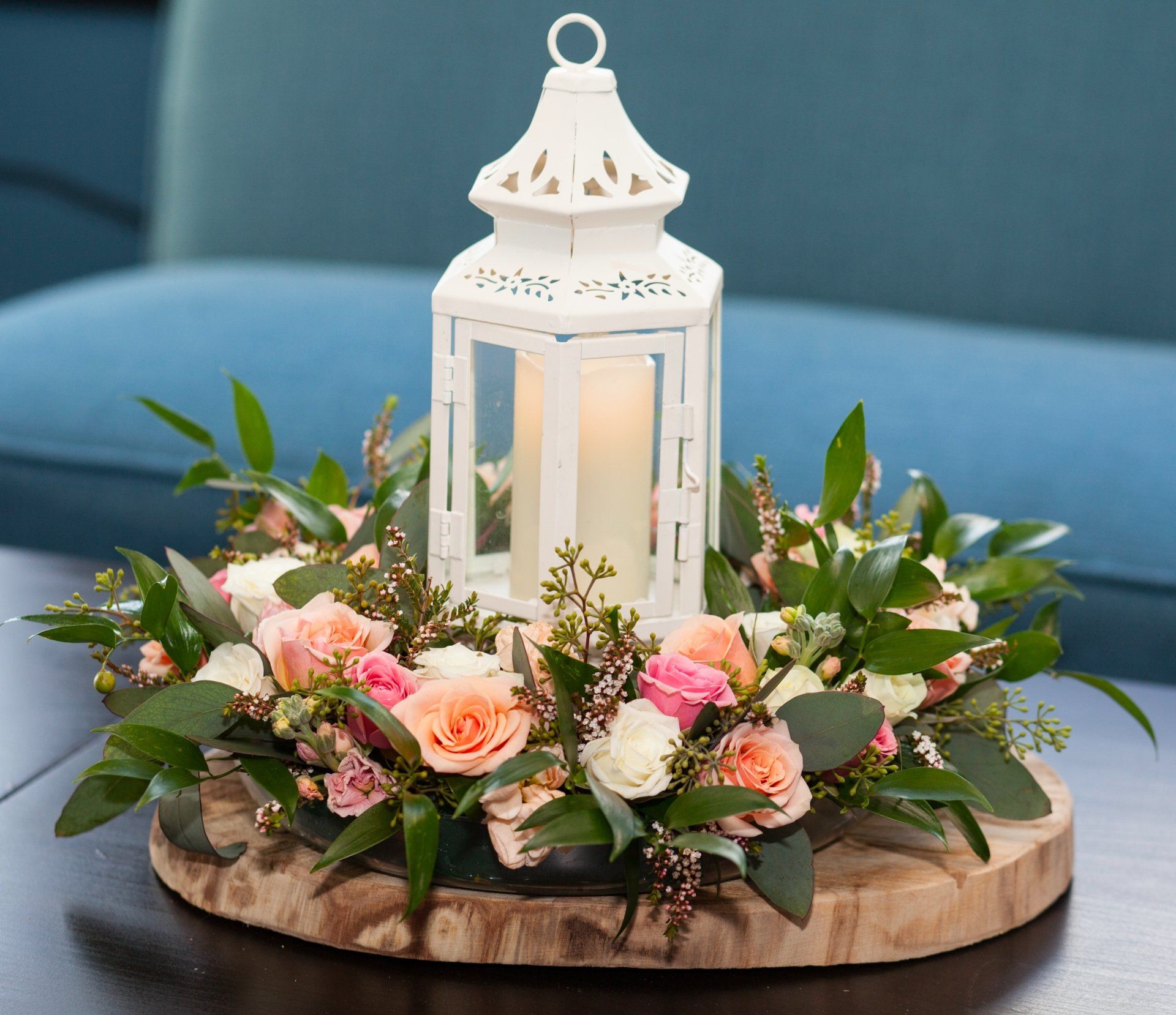 lantern centerpiece floral wreath lights wood