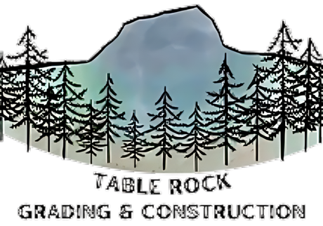 A logo for z & s construction company with an excavator