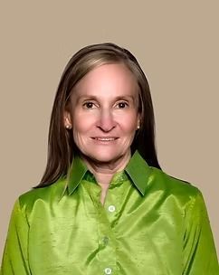 Woman with long brown hair smiles, wearing a bright green button-up shirt, against a neutral background.