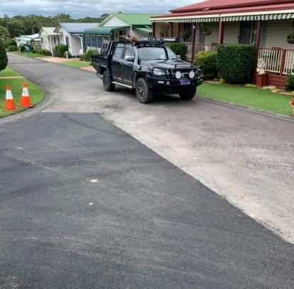 Black Truck is Parked on the Side of the Road — JP Civilworx Pty Ltd in Newcastle, NSW