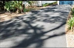 Shadow of a Tree is Cast on the Asphalt of a Driveway — JP Civilworx Pty Ltd in Gosford, NSW