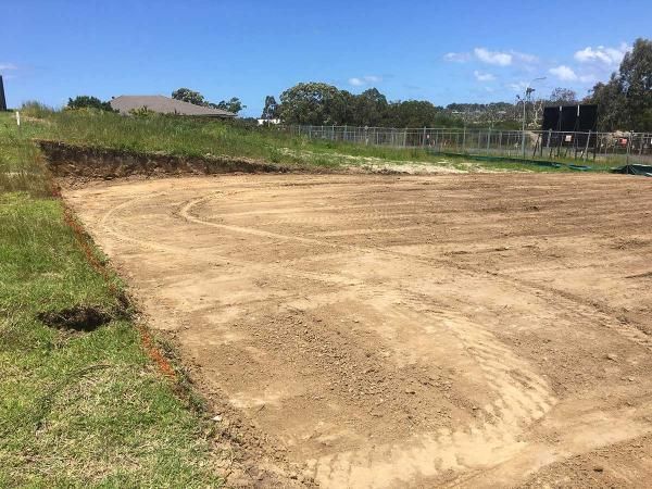 Dirt Field With a Fence and a House — JP Civilworx Pty Ltd in Muswellbrook, NSW