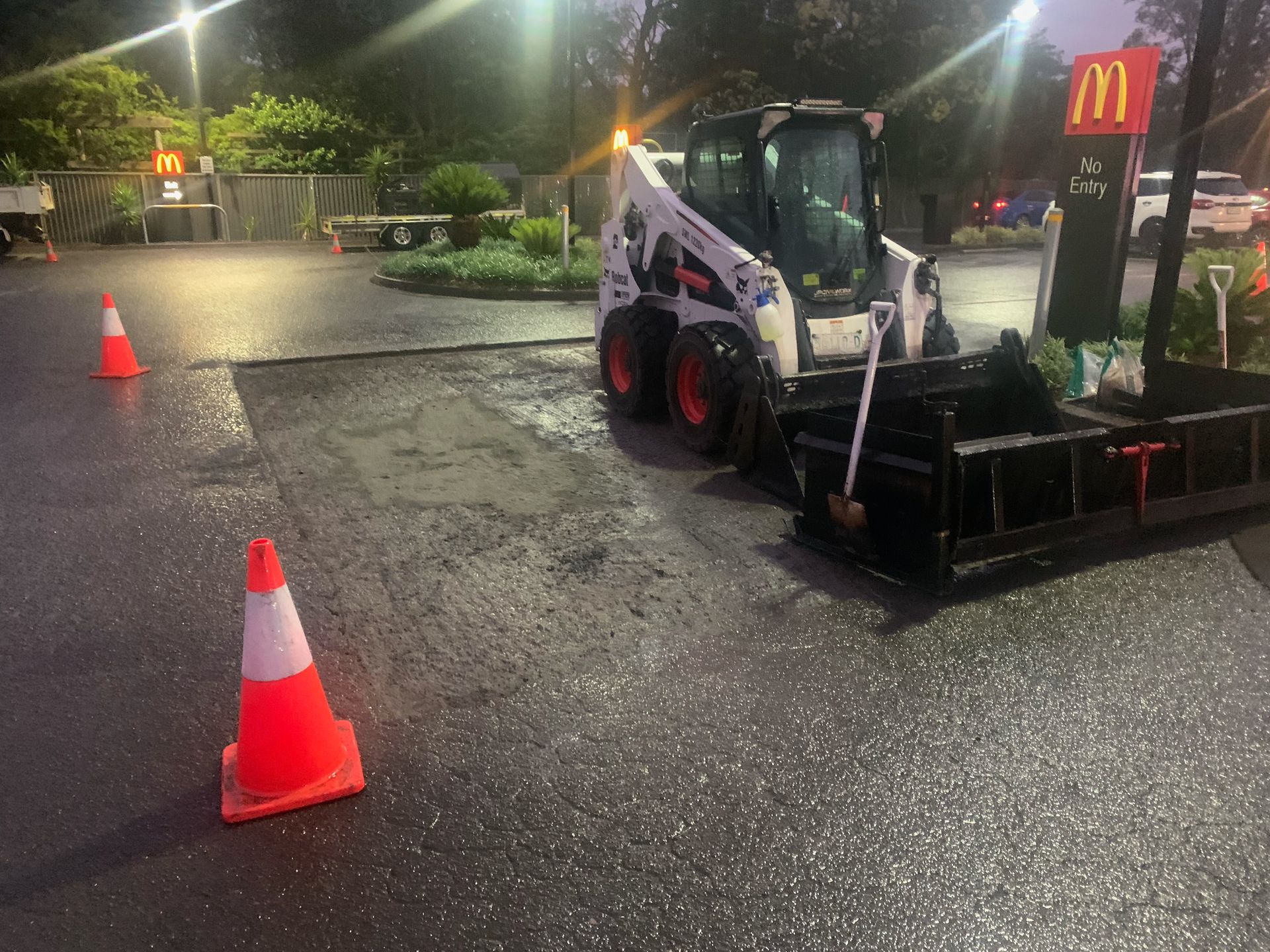 Bobcat Tractor Is Parked In A Carpark — JP Civilworx Pty Ltd in Eraring, NSW