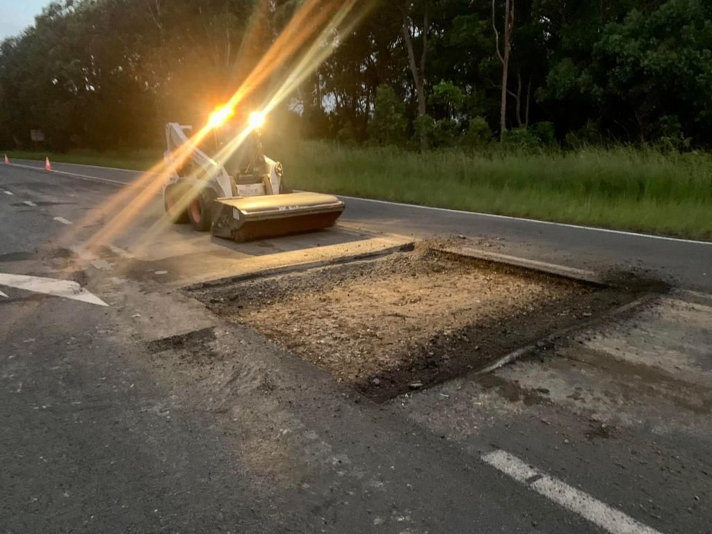 Bulldozer is Working on a Hole in the Road — JP Civilworx Pty Ltd in Port Stephens, NSW