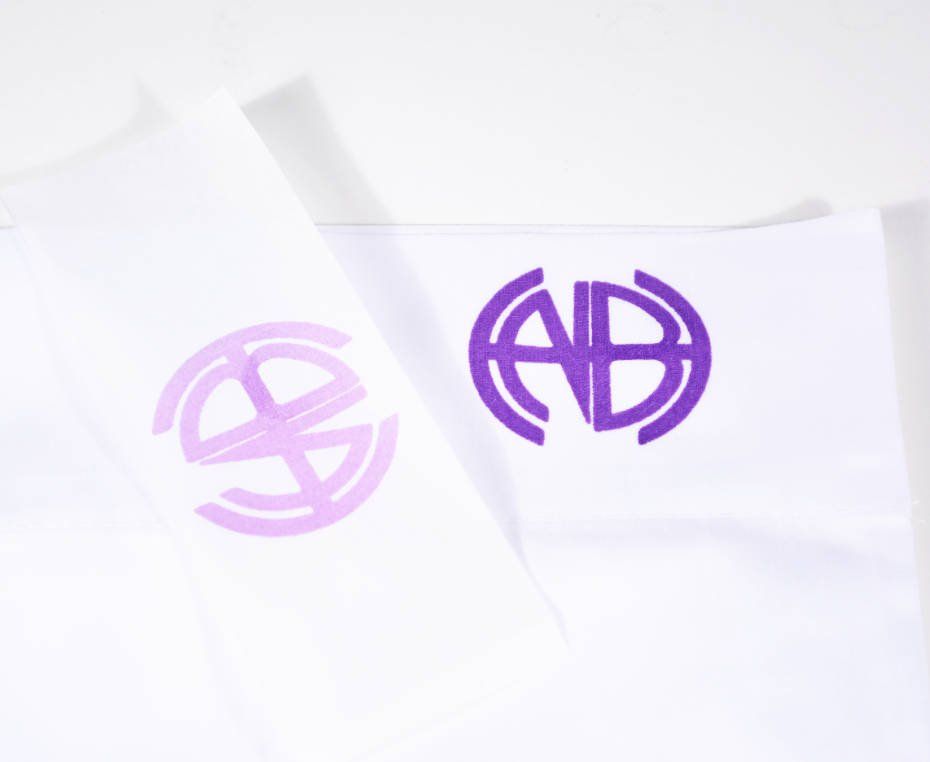 Unitherm Inc | Purple logo Iron On Transfer applied to linen