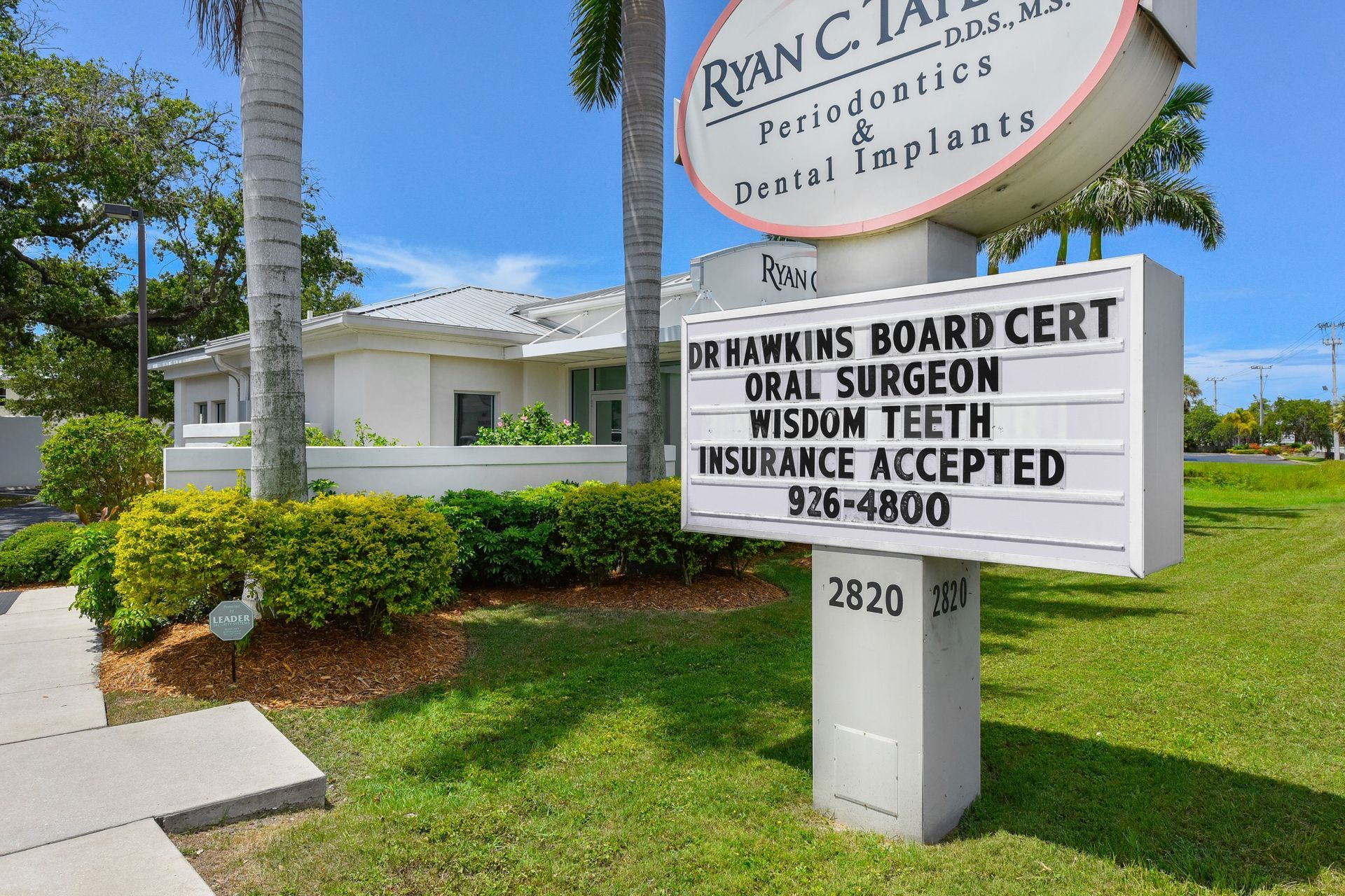A sign for ryan c. taylor 's dental office