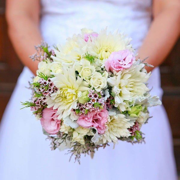 Bride Holding Flower Bouquet — Florists In Woolgoolga, NSW