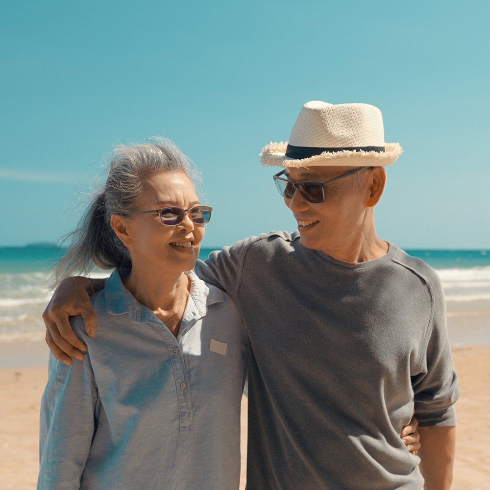 Senior Couple At The Beach — Lake Worth, FL — Mercer Law Immigration Attorneys