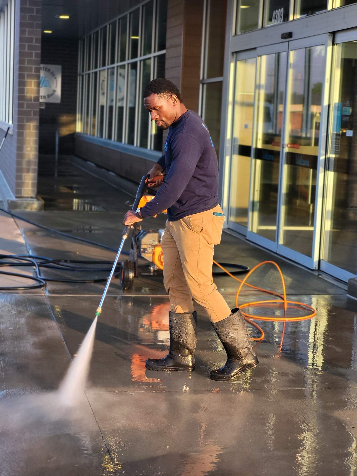 A group of janitors are cleaning an office.