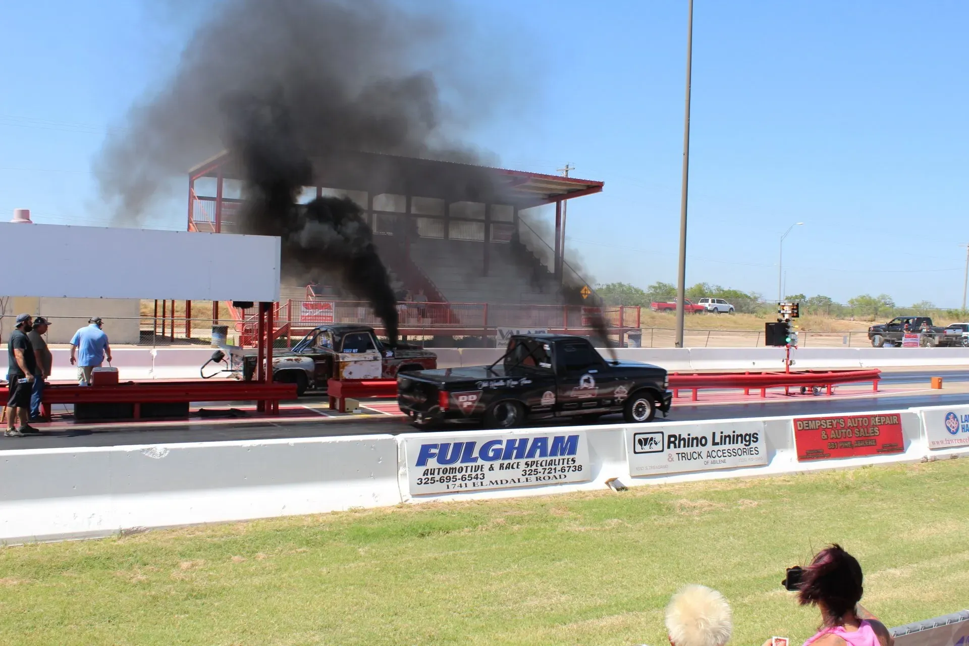 Texas Diesel Madness image showing black smoke from spinning wheels
