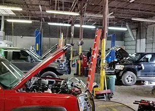 Automotive service and repairs image showing interior of repair shop