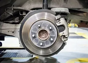 Brakes and suspension image showing brake disc and caliper