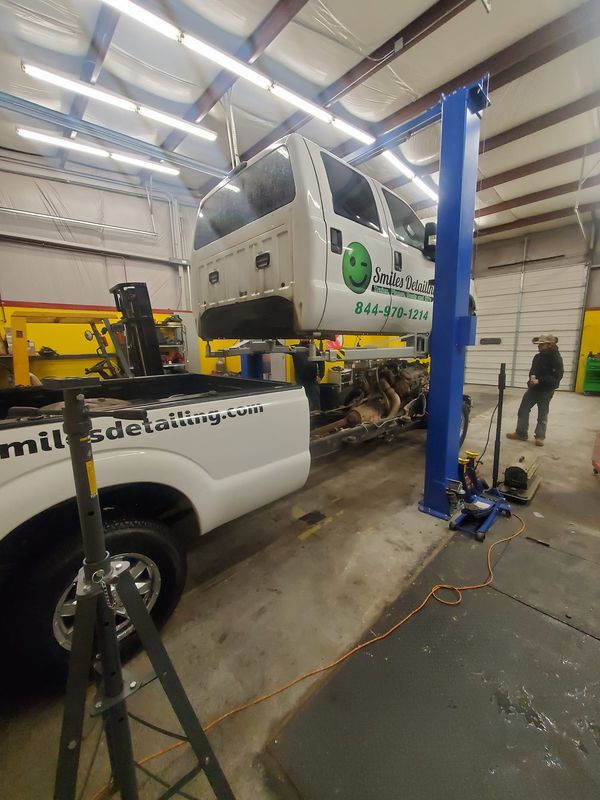 About Us imag showing a cab removal on a large sized pickup truck in shop