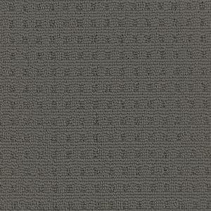 A close up of a gray carpet with a pattern on it.
