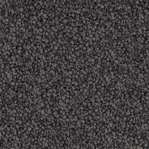 A close up of a gray carpet texture.