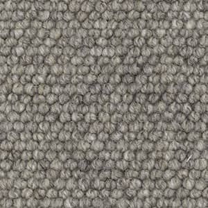 A close up of a gray carpet texture.