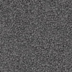 A close up of a gray carpet texture.