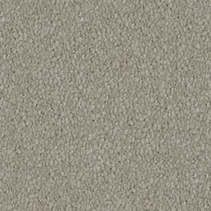 A close up of a gray carpet texture.