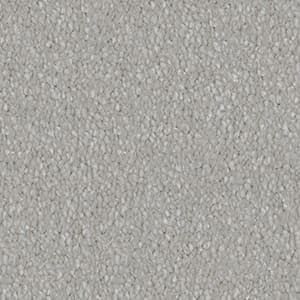 A close up of a gray carpet texture.