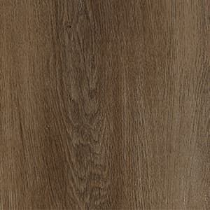 A close up of a piece of wood showing the grain and texture.