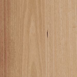 A close up of a piece of wood with a hole in it.