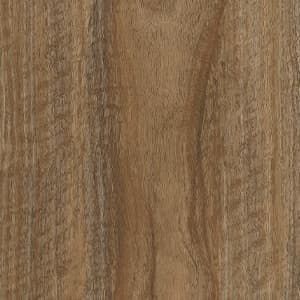 A close up of a piece of wood showing the grain and texture.