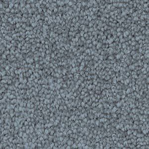 A close up of a gray carpet texture.