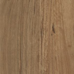 A close up of a wooden floor with a grain and texture.