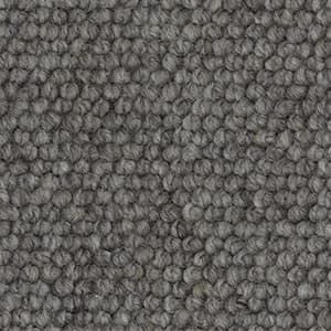 A close up of a gray carpet texture.